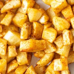 Close up of air fryer home fries.