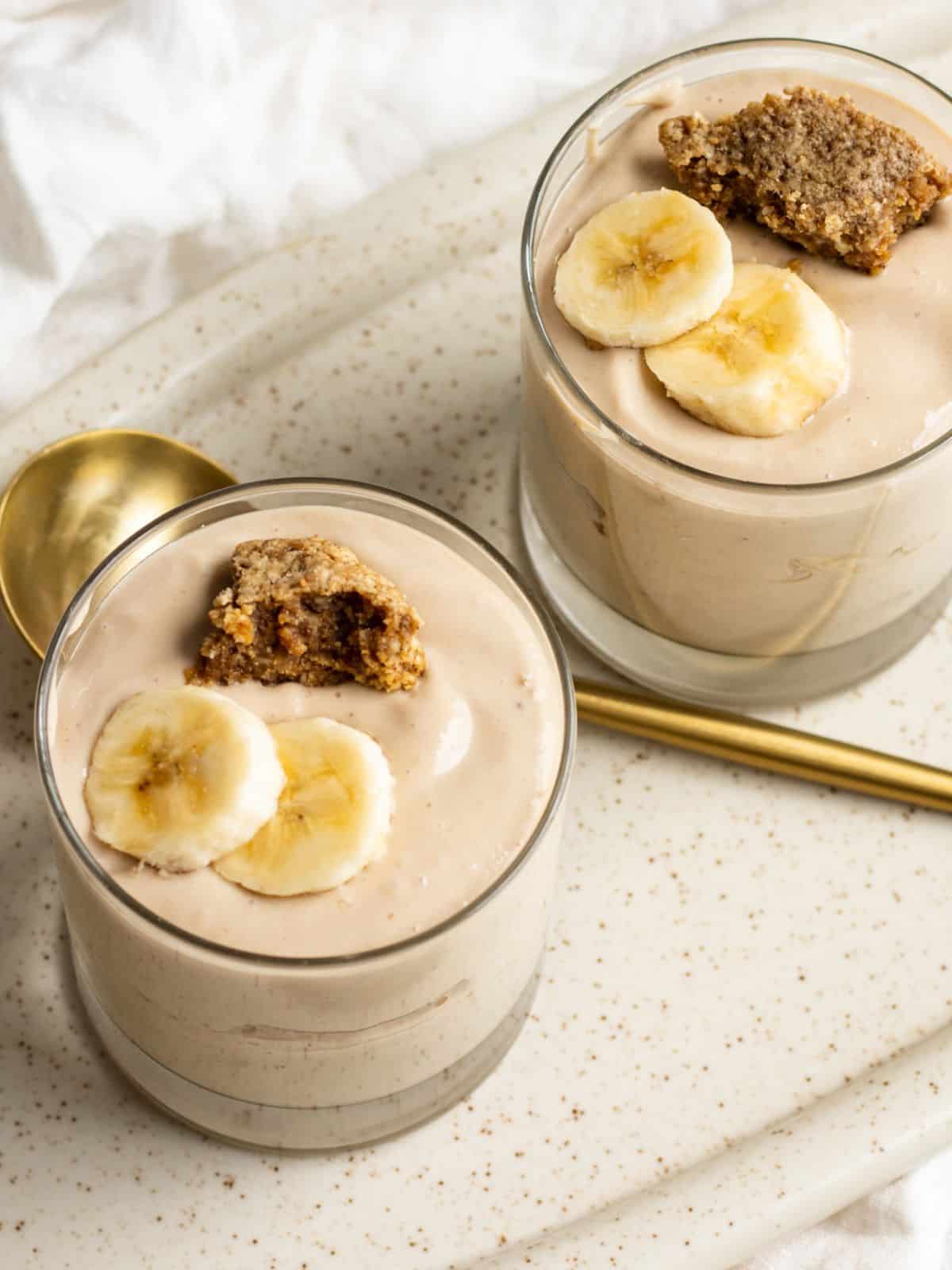 Banana pudding in small serving cups. 
