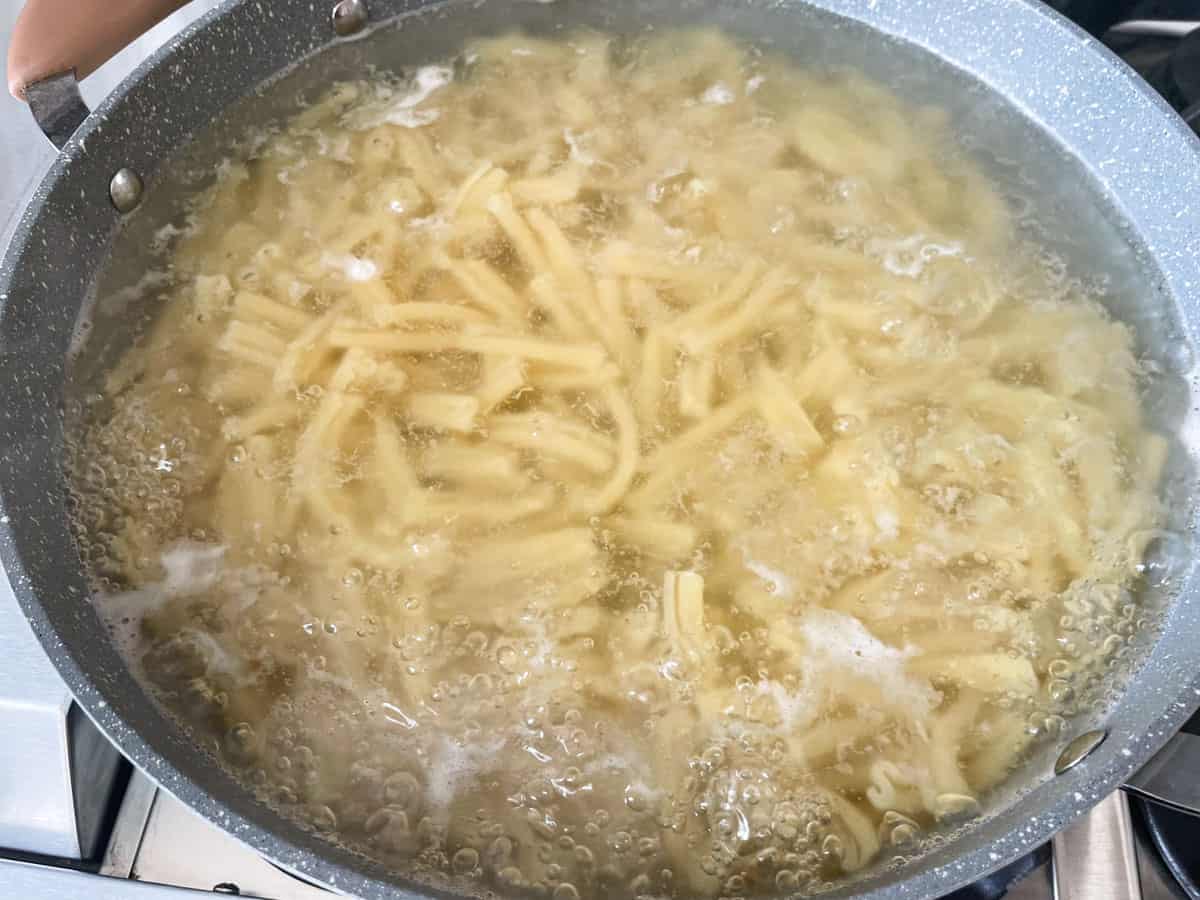 Pasta in boiling water.
