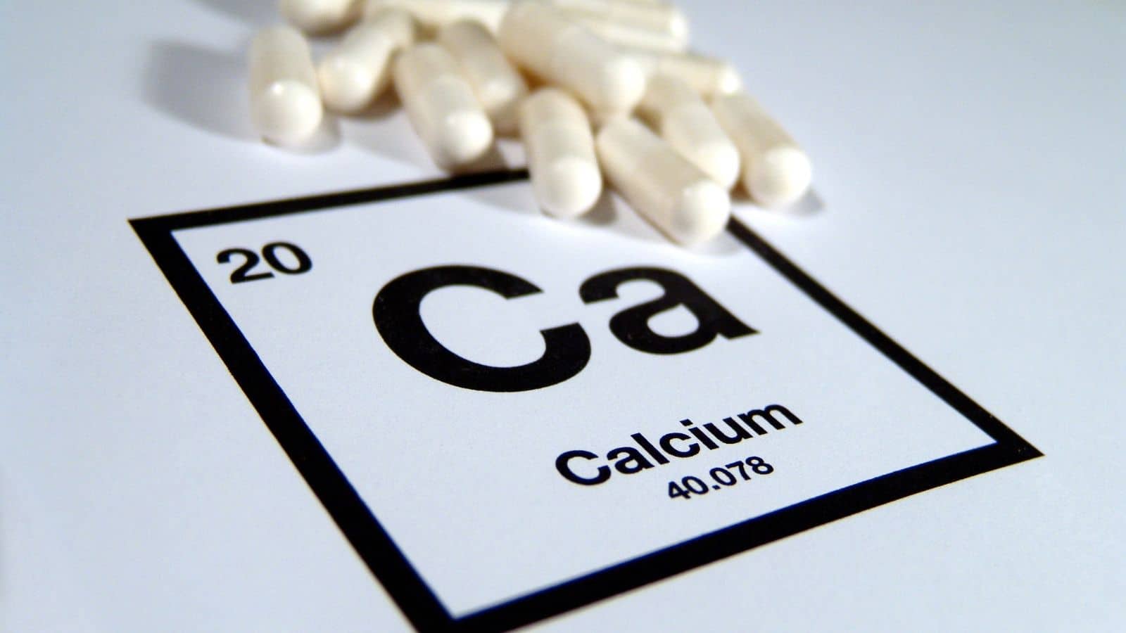 Calcium symbol and vitamins.