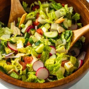 Fattoush salad in wood bowl.