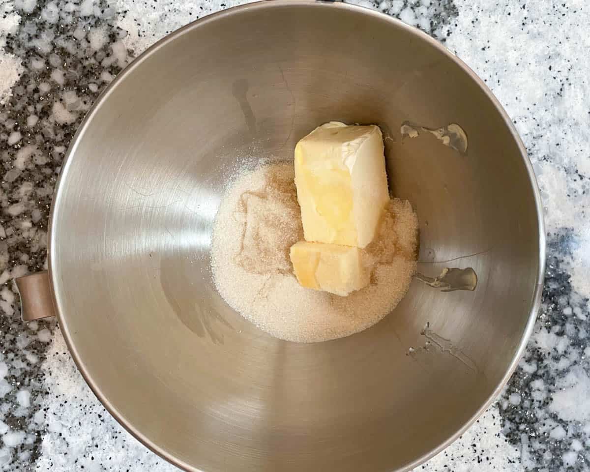 Butter and sugar in mixing bowl.
