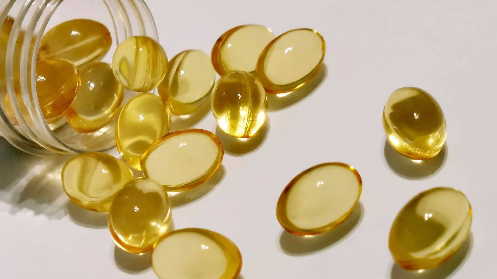 Close up of vitamin E capsules.
