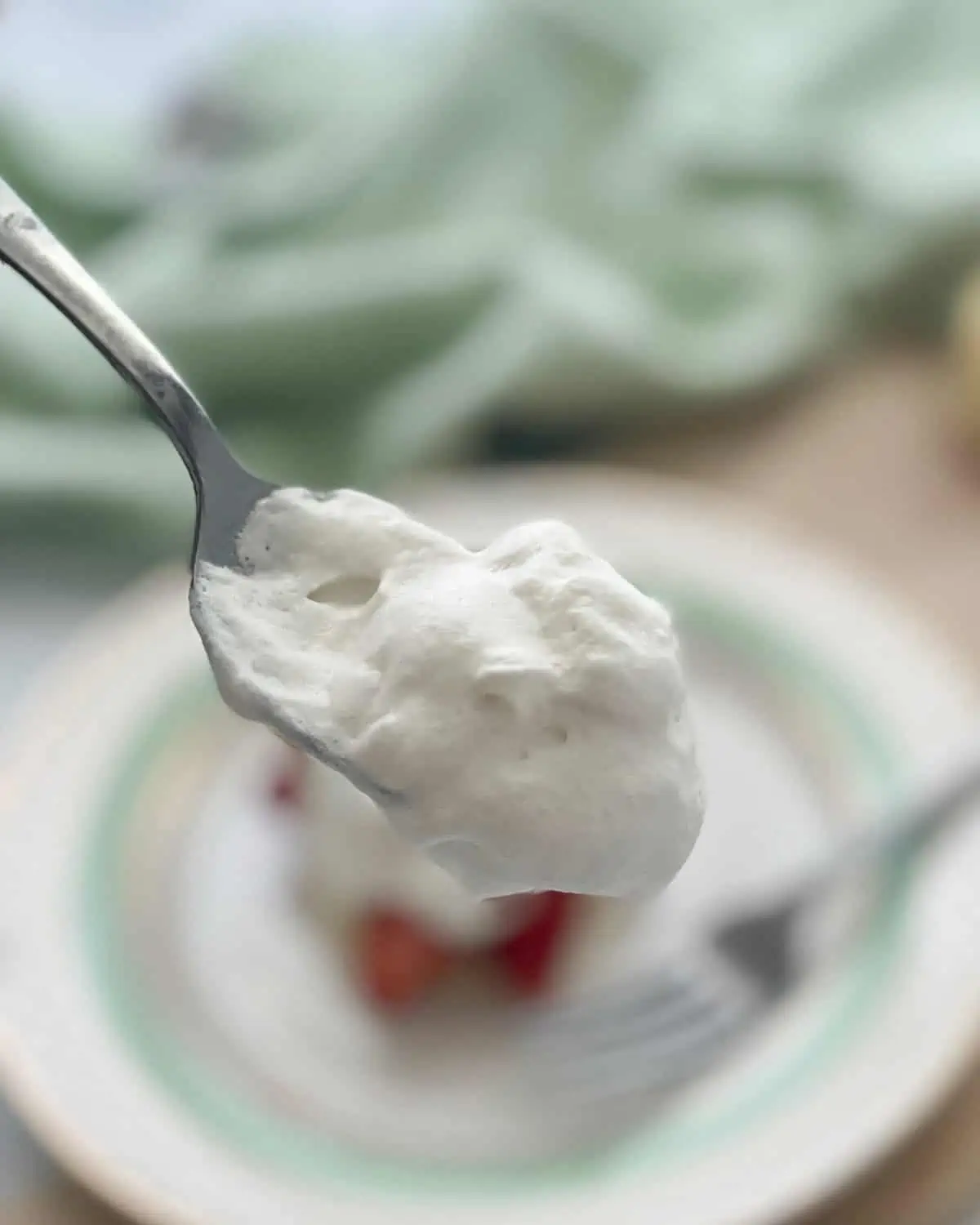 Vegan whipped cream on a spoon. 