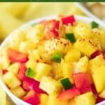 Small serving bowl of pineapple mango salsa.