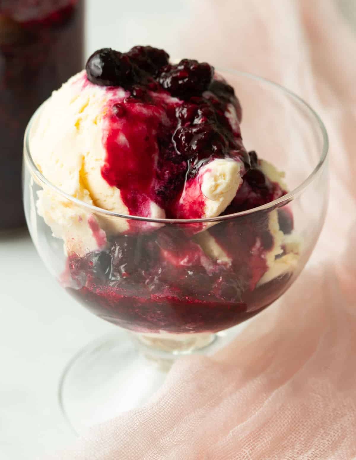 Berry compote on top of vanilla ice cream.
