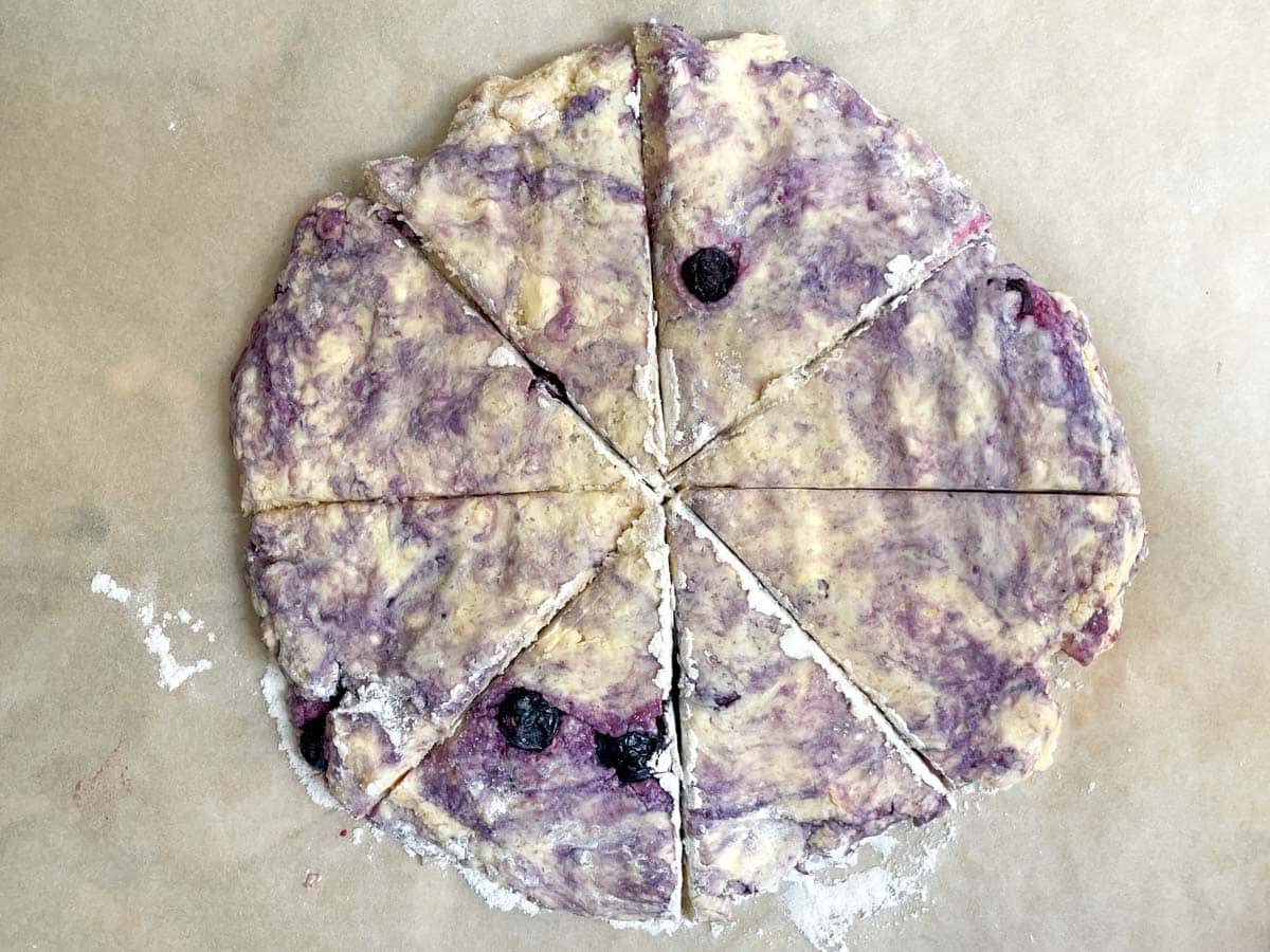Circle of scone dough into triangles.
