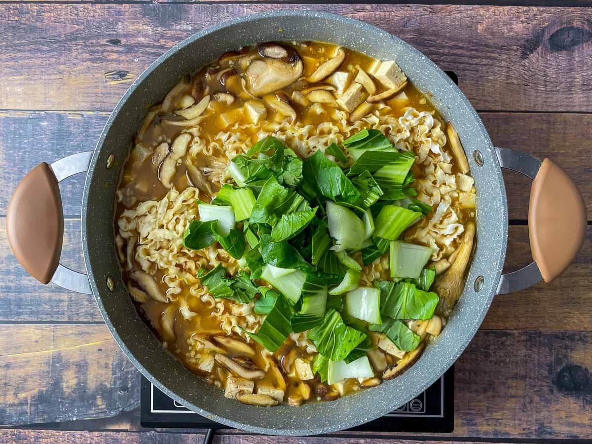 Bok choy added to miso ramen noodles.
