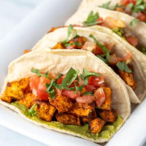 Sweet potato tacos on a serving platter.