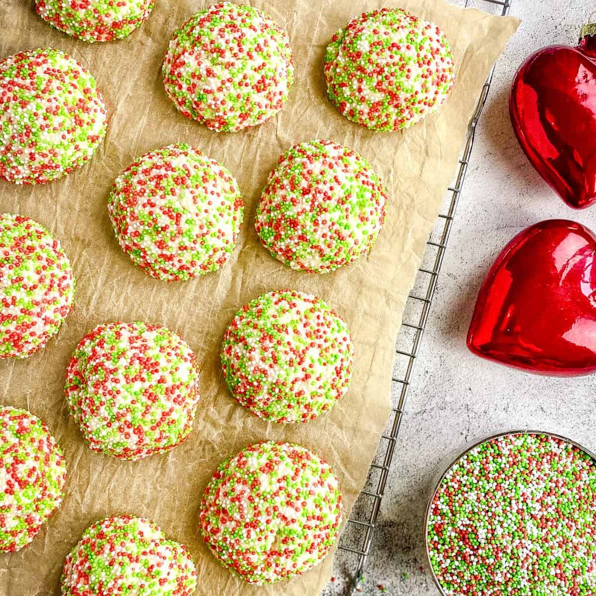 Sugar cookies covered in red and green sprinkles.