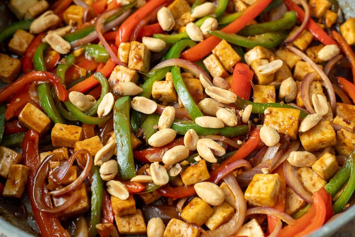 Kung pao tofu topped with peanuts.