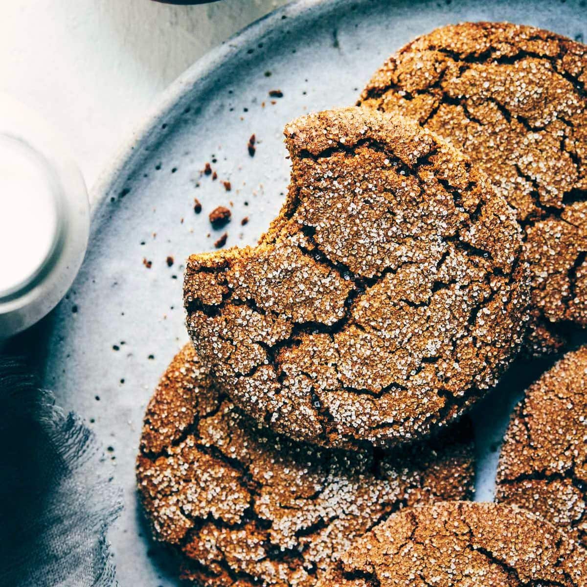 Close up of vegan molasses cookies on a plate. 