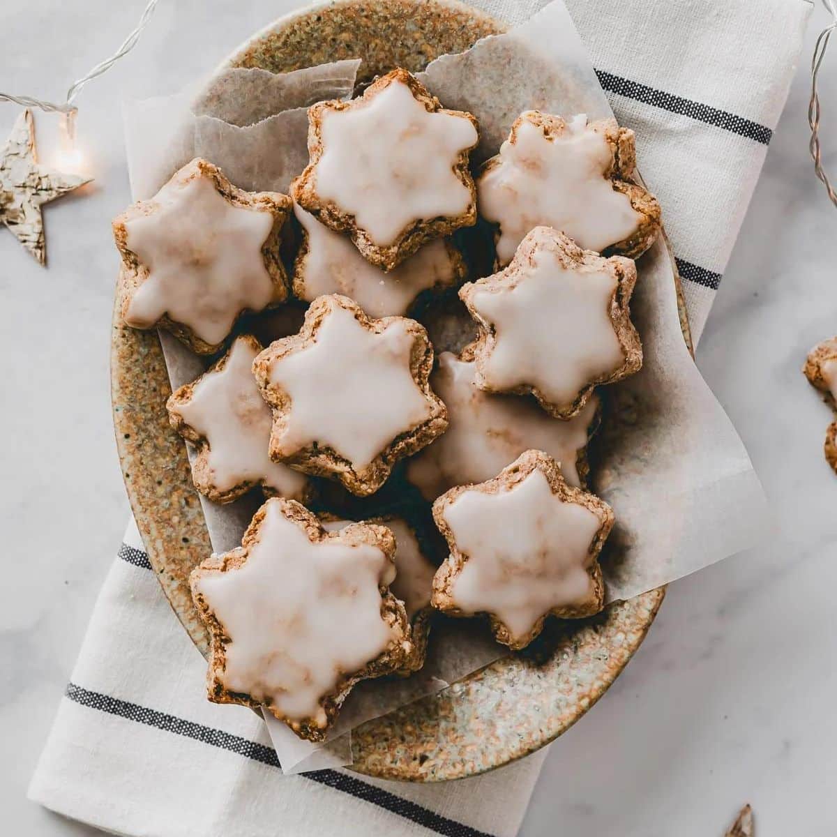 Cinnamon star cookies on a platter.