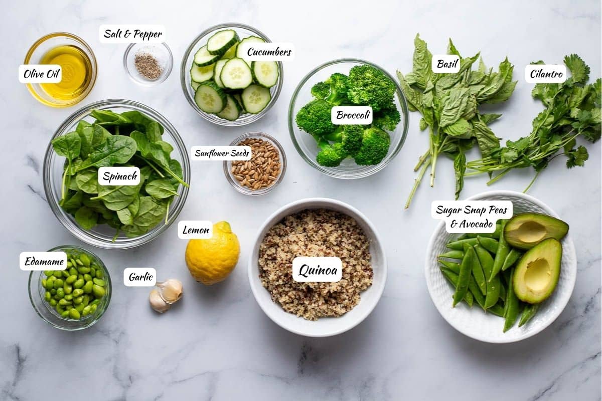 Green Goddess Bowl Ingredients: Olive oil, salt, pepper, cucumber, broccoli, basil, cilantro, sugar snap peas, avocado, quinoa, lemon, garlic, sunflower seeds, edamame, spinach.
