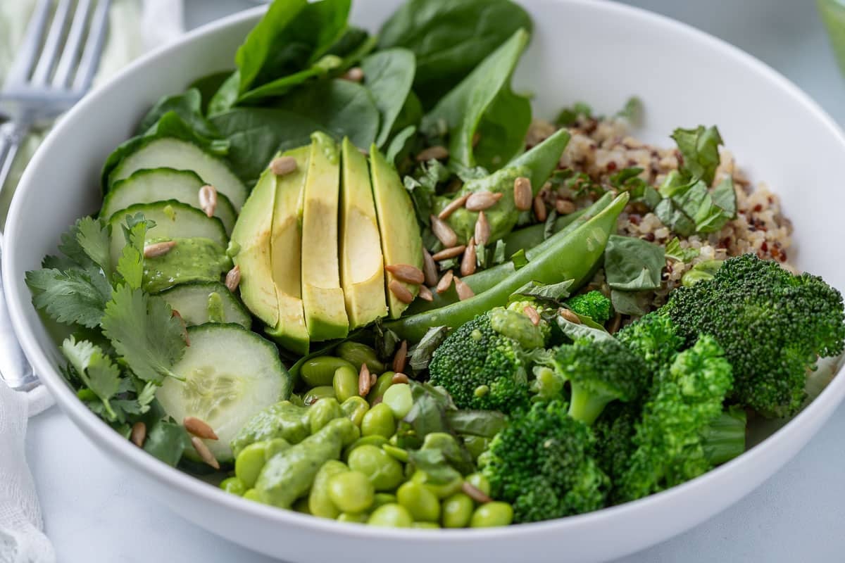 Green goddess bowl with fresh vegetables and quinoa.