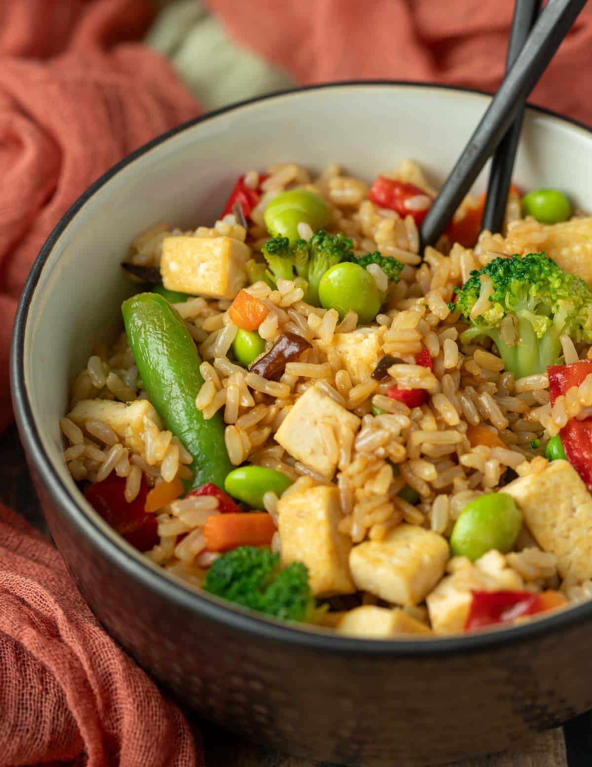 Vegan stir-fried rice in a serving bowl.