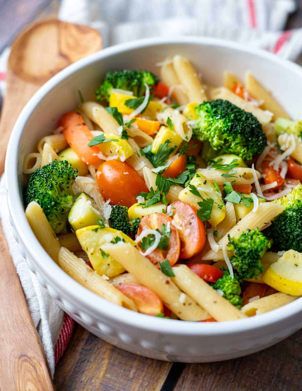 Vegan pasta primavera in serving bowl.