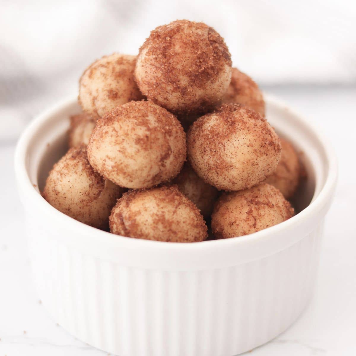 Bowl of vegan donut holes.