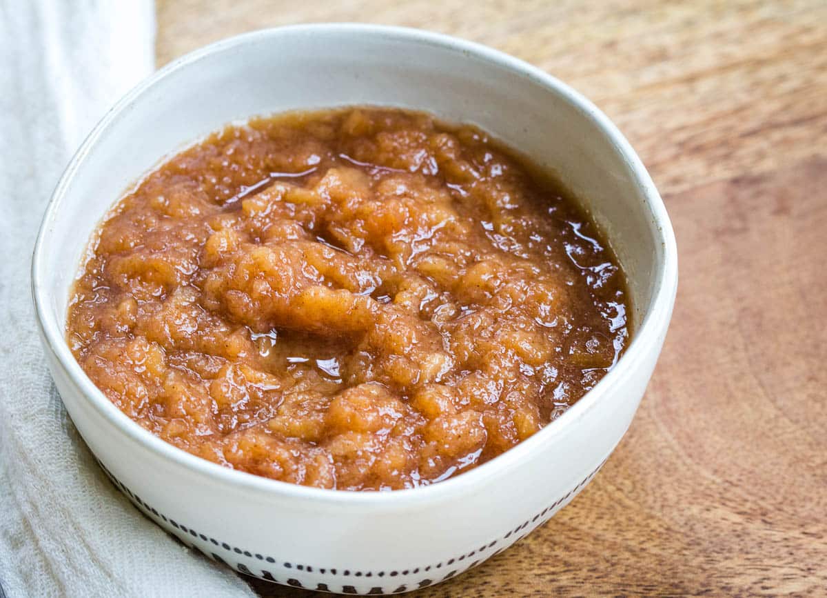 Cinnamon applesaue in a small bowl.