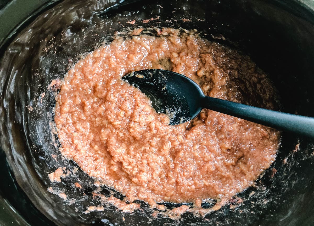 Mashed applesauce in a slowcooker.