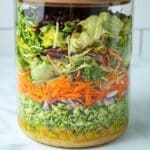 Broccoli crunch salad, layered in a jar.