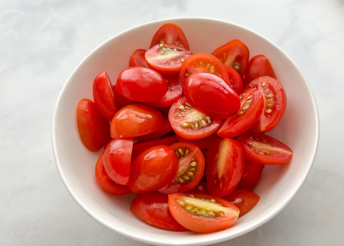 Cherry tomatoes cut in half.