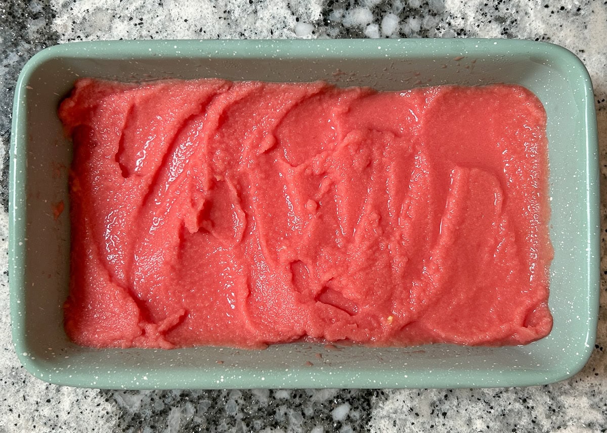 Watermelon puree in loaf pan.