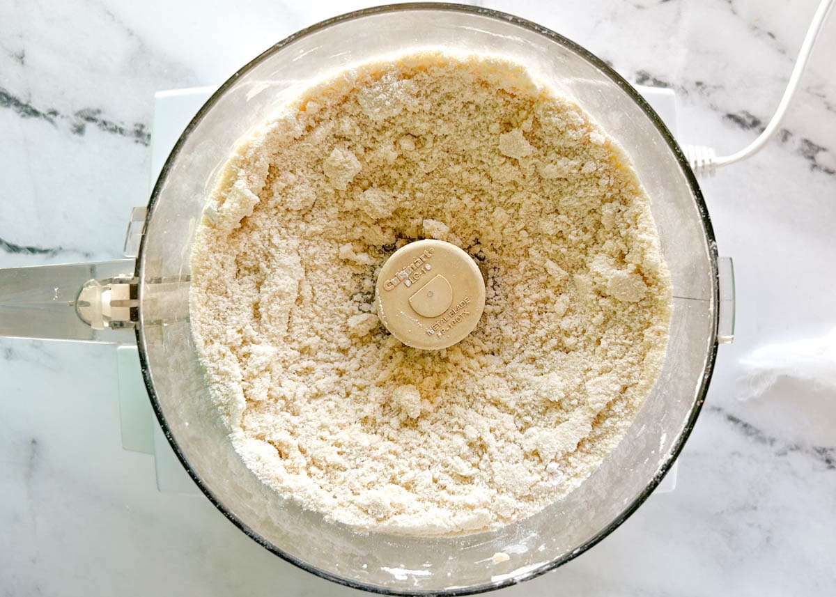 Flour and butter crumble in food processor.