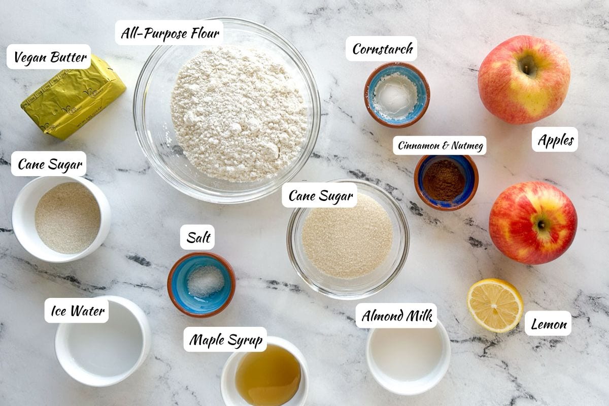 Apple Galette Ingredients: Vegan butter, all-purpose flour, cornstarch, apples, lemon, almond milk, maple syrup, cold water, salt, cane sugar.