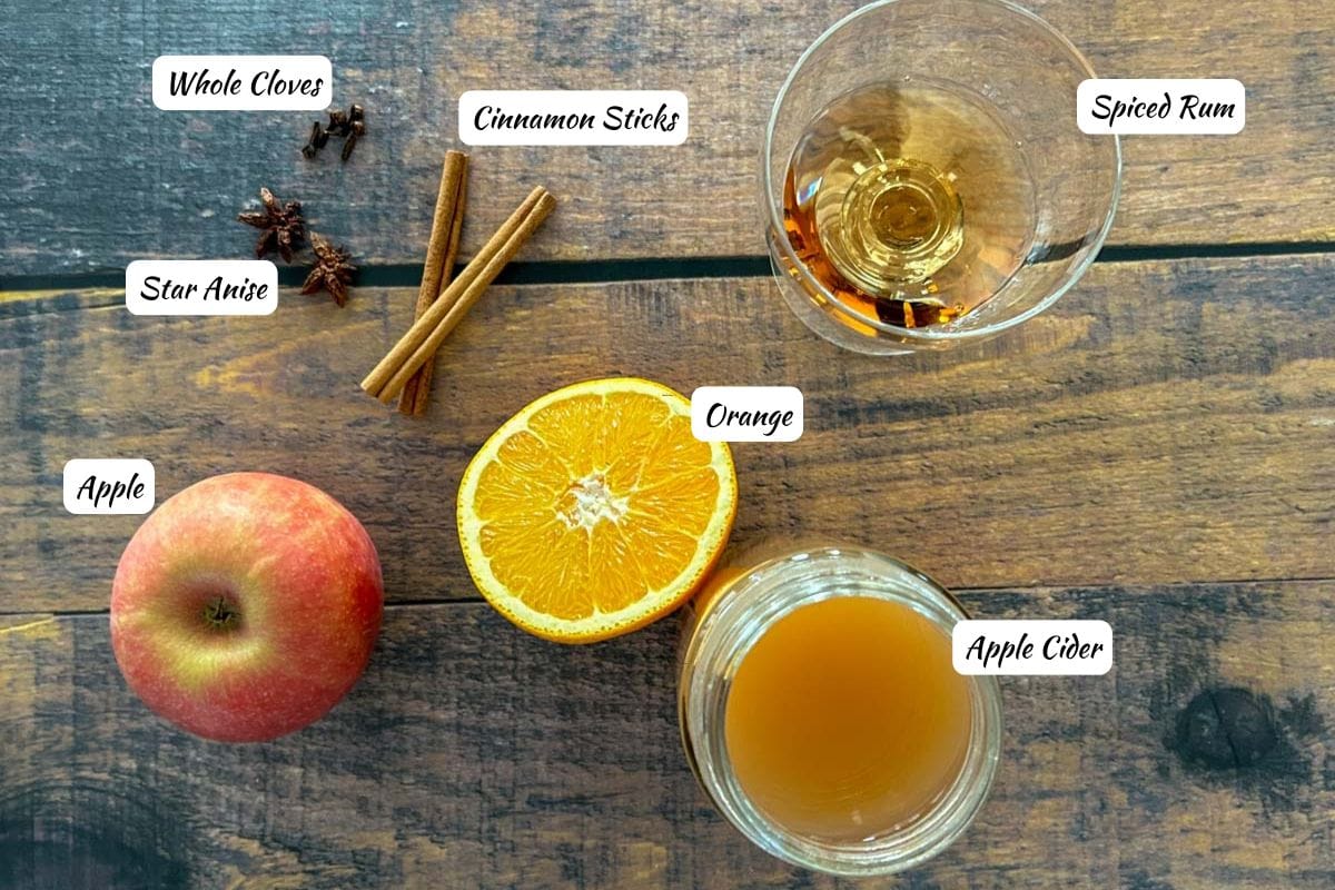 Hot apple cider ingredients with ingredient labels.